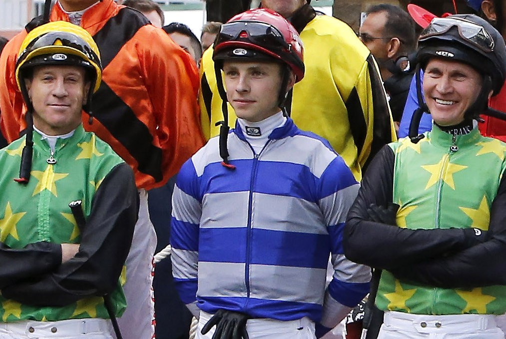 Shoulder to shoulder: Lyle Hewitson, just 18 at the time, is flanked by former South African multiple champion jockeys Anton Marcus (left) and Pierre Strydom in a group photo taken before the 2016 Durban July (which Strydom won on The Conglomerate). Photo: Michele MacDonald
