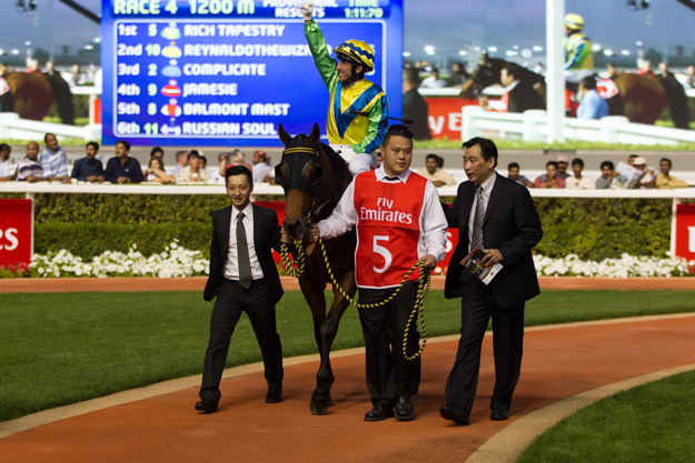 Trainer Michael Chang (far right) with Rich Tapestry after winning the G3 Mahab Al Shimaal at Meydan in March. Photo: HKJC.