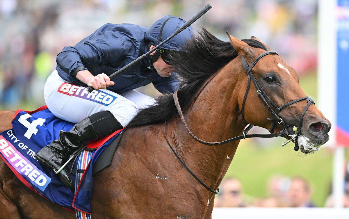 Derby hero: City Of Troy scores under Ryan Moore at Epsom. Photo: Francesca Altoft / focusonracing.com