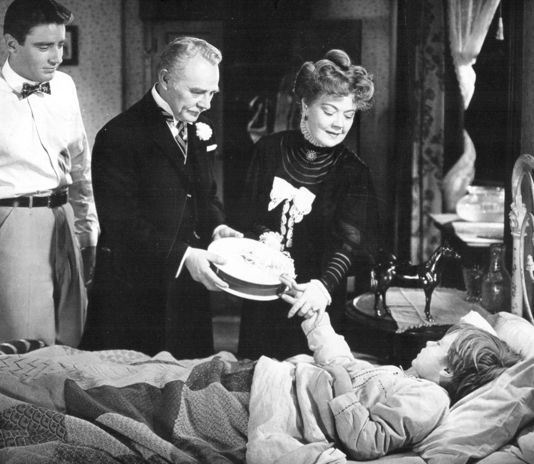 Bedridden Lewie gets a visit from the gambler hoping the boy still talks to horses. (MGM photo)