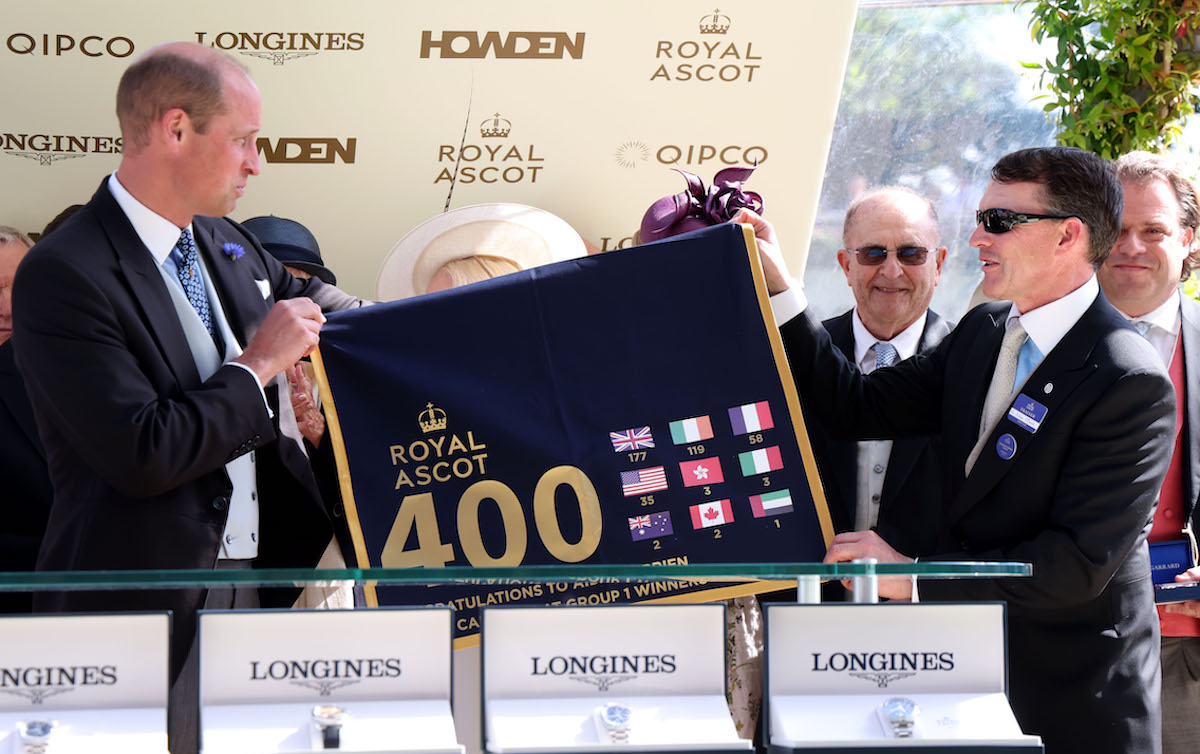 400-up: Aidan O'Brien is presented with a commemorative saddlecloth by the Prince of Wales. Photo: Dan Abraham / focusonracing.com