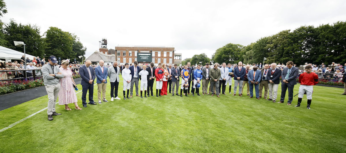 A minute's silence: assembled media and jockeys at Newmarket on Thursday pay their respects. Photo: Dan Abraham / focusonracing.com