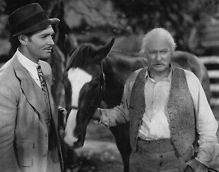 Duke Bradley saves the day for Grandpa Clayton (Lionel Barrymore) and his colt Moonray. (MGM photo)