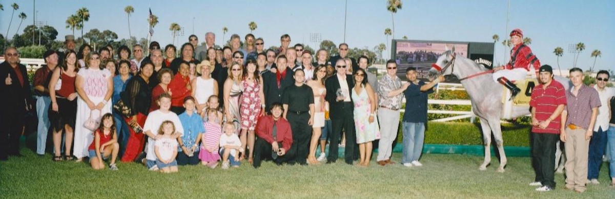 The Hollywood Park winner's circle bursts at the seams with the Star Over The Bay entourage after his victory in the 2004 Sunset Handicap. (Benoit photo)