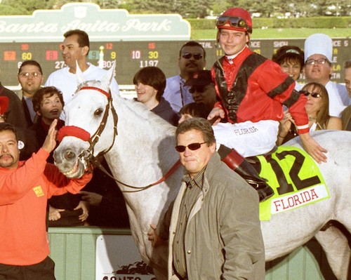 Trainer Mike Mitchell with Star Over The Bay after their big payday in the Sunshine Millions Turf. (Benoit photo)