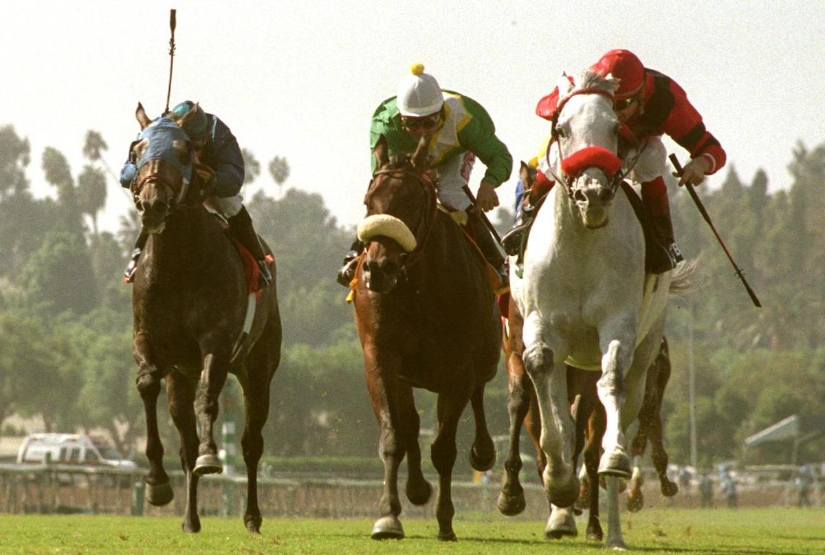 The accomplished Sarafan (center) pushes Star Over The Bay to the limit in the Clement Hirsch Memorial at Santa Anita. (Benoit photo)