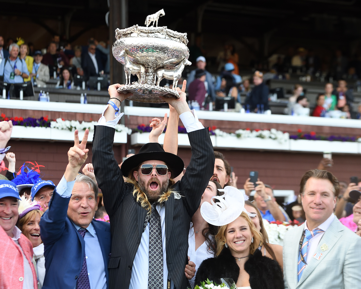 Big-league triumph: Jayson Werth hoists aloft the Belmont Stakes trophy. Photo: NYRA/Janet Garagulo (Coglianese)