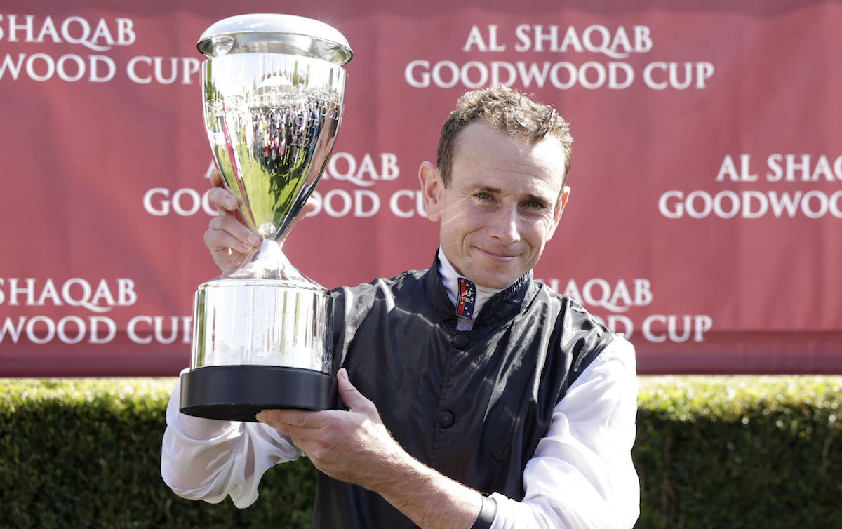 World #1 jockey Ryan Moore with the Goodwood Cup. Photo: Dan Abraham / focusonracing.com