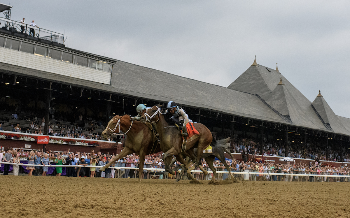 Determined success: Power Squeeze (far side) gets the better of Candied in the G1 Alabama. Photo: NYRA / Coglianese