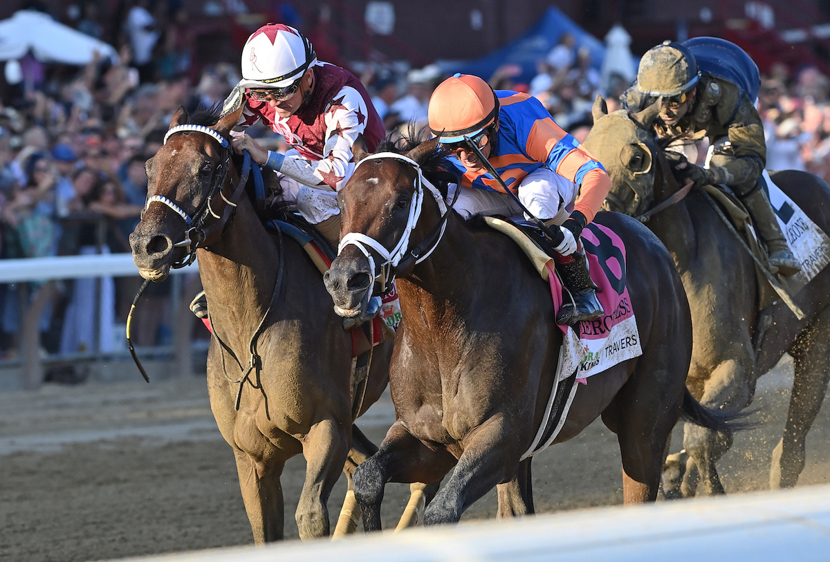 Fierceness (John Velazquez, near side) holds Thorpedo Anna to win the Travers Stakes. Photo: NYRA/Angelo Lieto