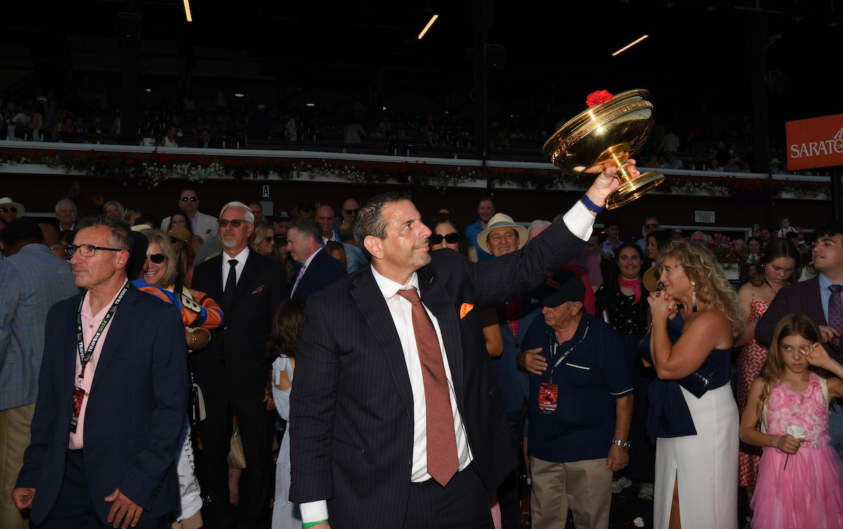 Owner Mike Repole with the trophy after Fierceness’s Travers Stakes win. Photo: NYRA/Coglianese