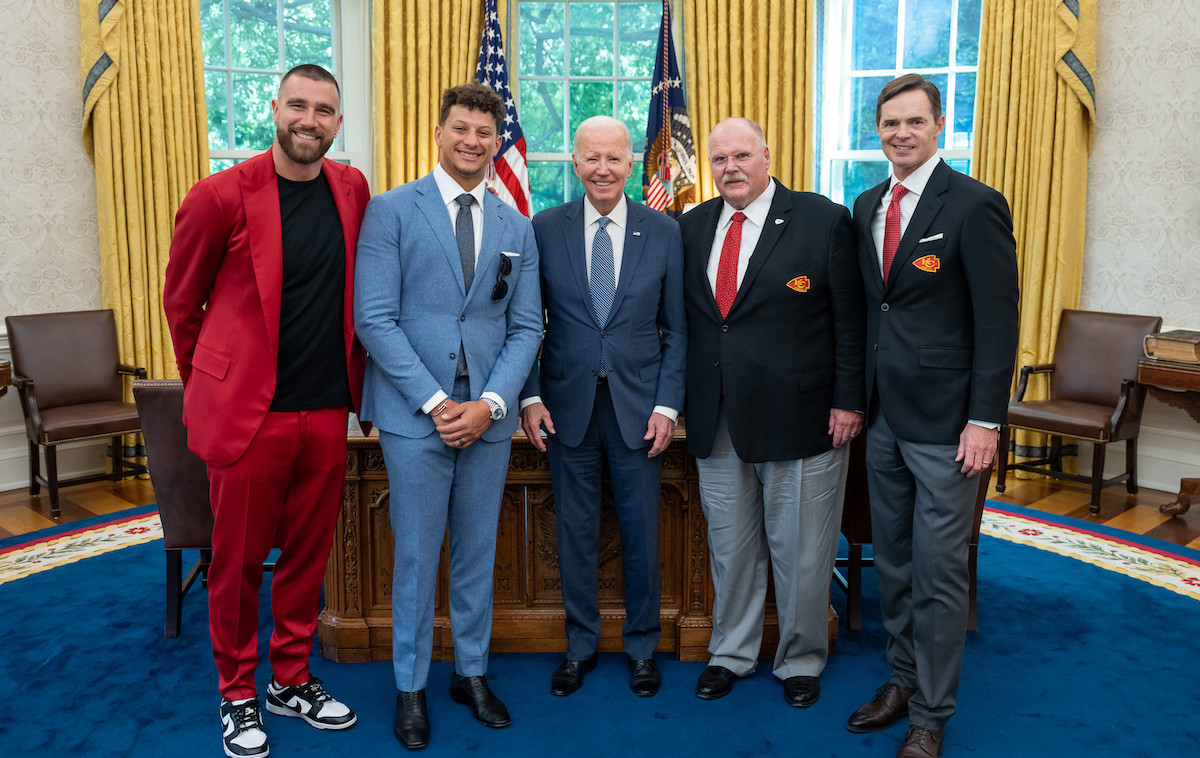 Super Bowl champions: president Joe Biden greets Travis Kelce (left) and Kansas City Chiefs teammate Patrick Mahomes (second left) plus club president Mark Donovan and coach Andy Reid at the White House. Photo: Adam Schultz (Public Domain)