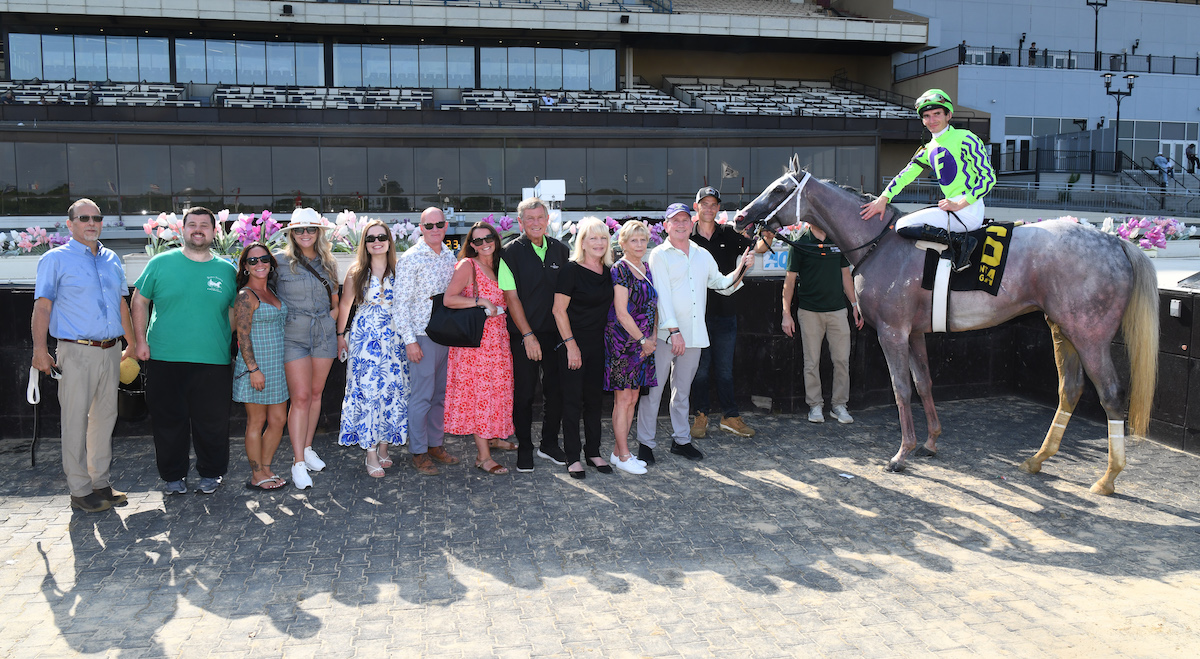 Say cheese: Next and his connections in the winner’s photo after an easy victory in the Brooklyn. Photo: NYRA/Coglianese