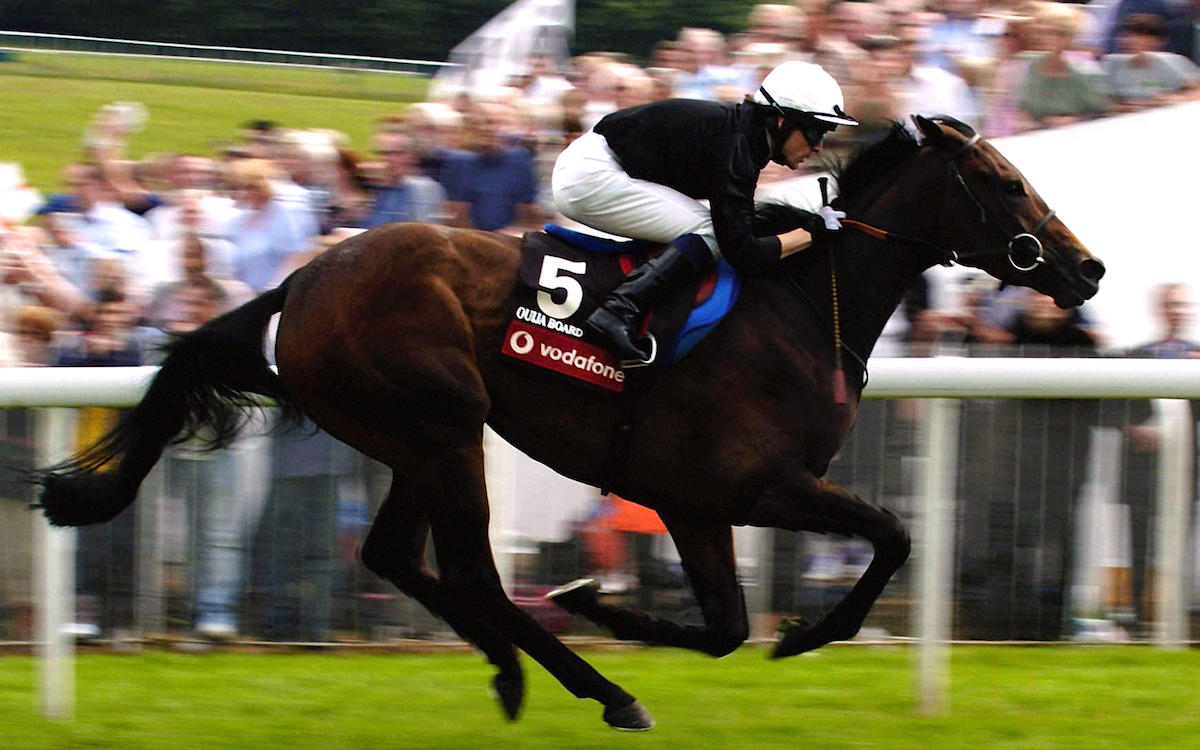 Ouija Board in full flight under Kieren Fallon in the Oaks at Epsom in June 2004. Photo: Rebecca Naden (PA Images/Alamy Stock Photo)