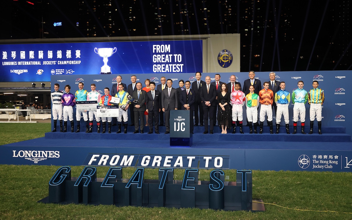 A world-class line-up of jockeys with officials at the presentation ceremony at Happy Valley. Photo: HKJC