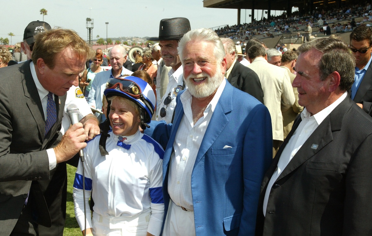 Mike Willman interviews the jubilant Julie Krone, Sid Craig and Ron McAnally after the Pacific Classic. (Benoit photo)