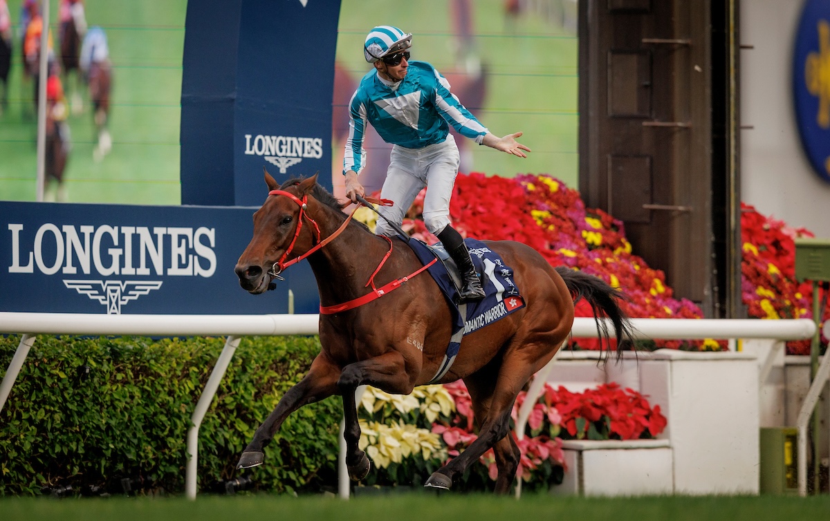 James McDonald taunts rivals as Romantic Warrior completes a hat-trick in the Hong Kong Cup. Photo: Alex Evers/Hong Kong Jockey Club