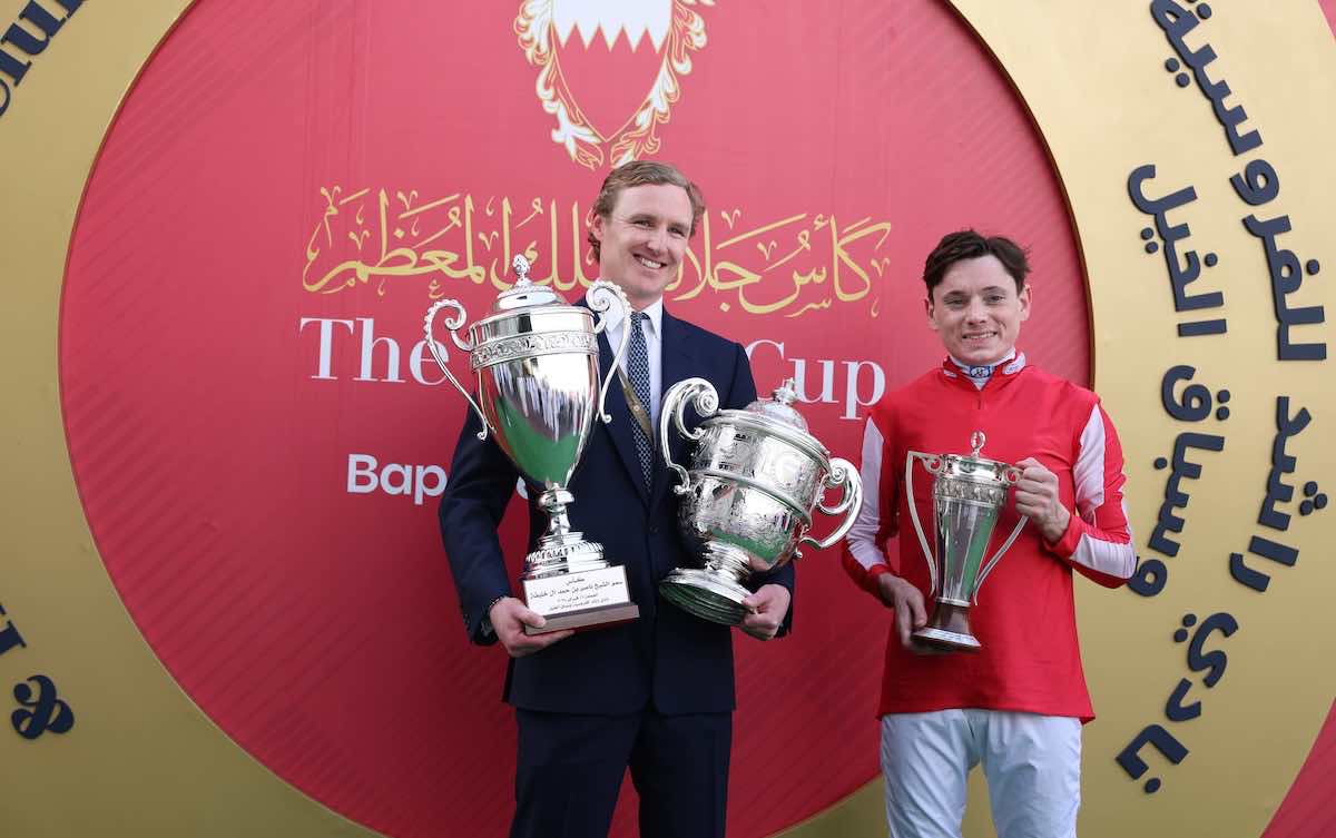 George Scott and jockey Callum Shepherd with King's Cup trophies in Bahrain. Photo: Bahrain Turf Club