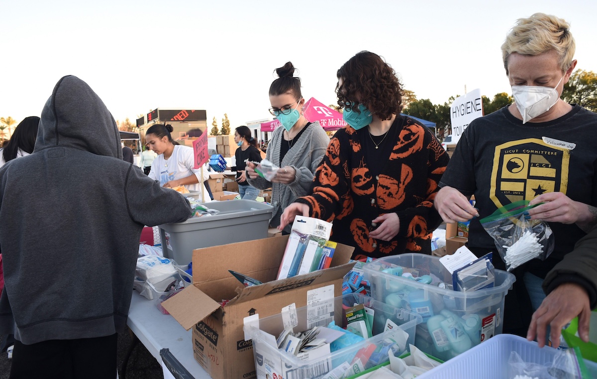 Volunteers at Santa Anita sort through donations for those impacted by the Eaton Fire. Photo: Catherine Bauknight/ZUMA Press Wire (Alamy)