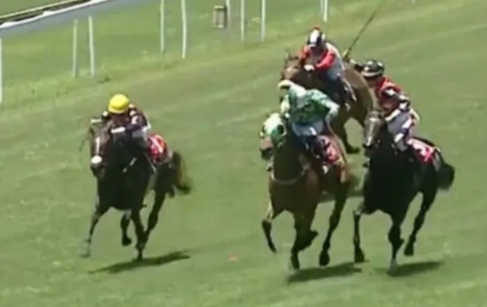 Video screenshot shows Gavin Lerena raising his whip to strike rival jockey at Turffontein