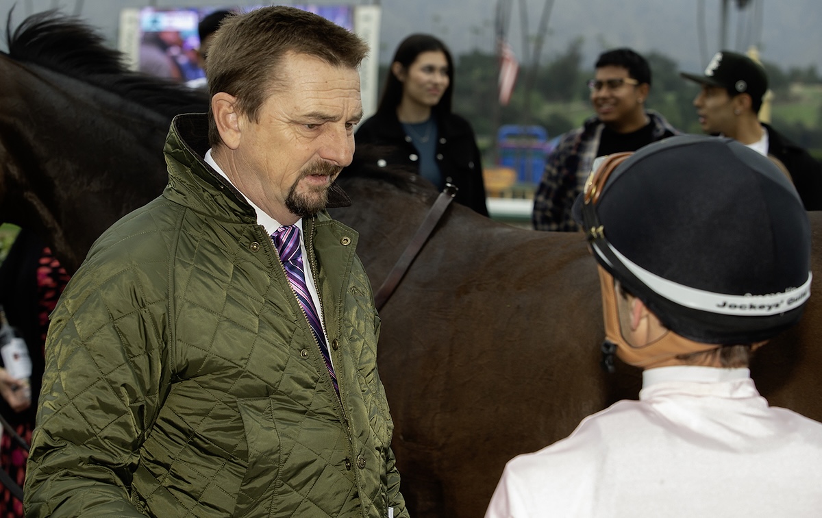 Four-timer: trainer Michael McCarthy talks to Flavien Prat at Santa Anita. Photo: Benoit